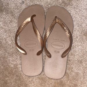 gold flip flops